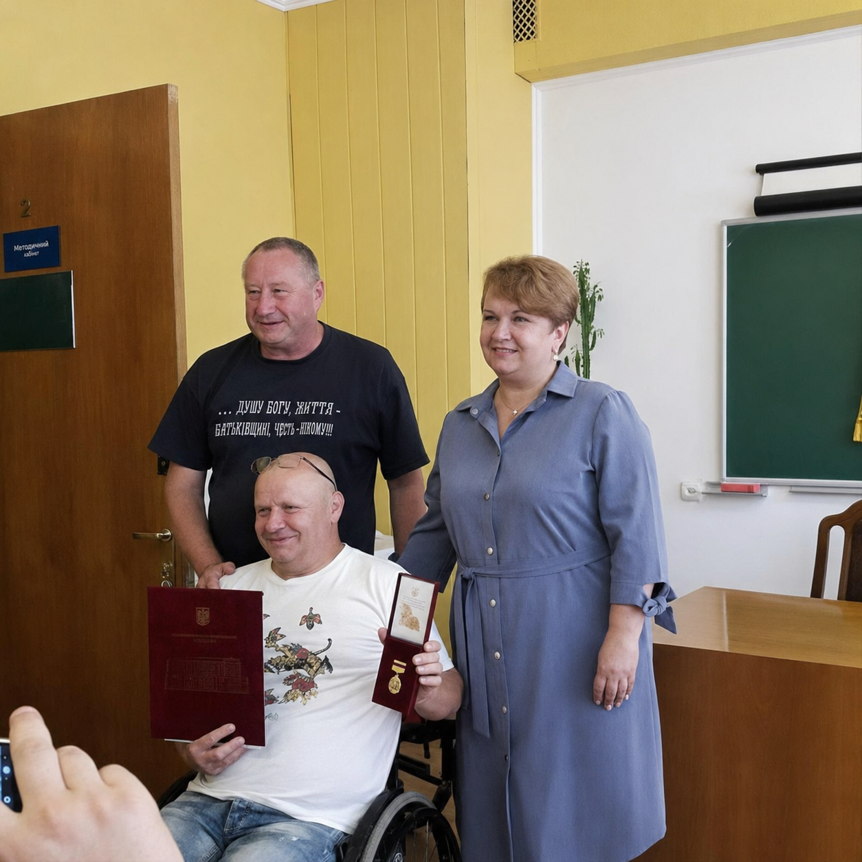 Award ceremony with medal and certificate